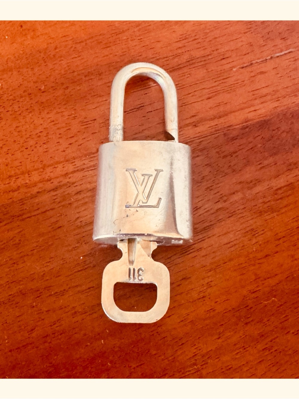 LOUIS VUITTON BRASS PADLOCK AND KEY